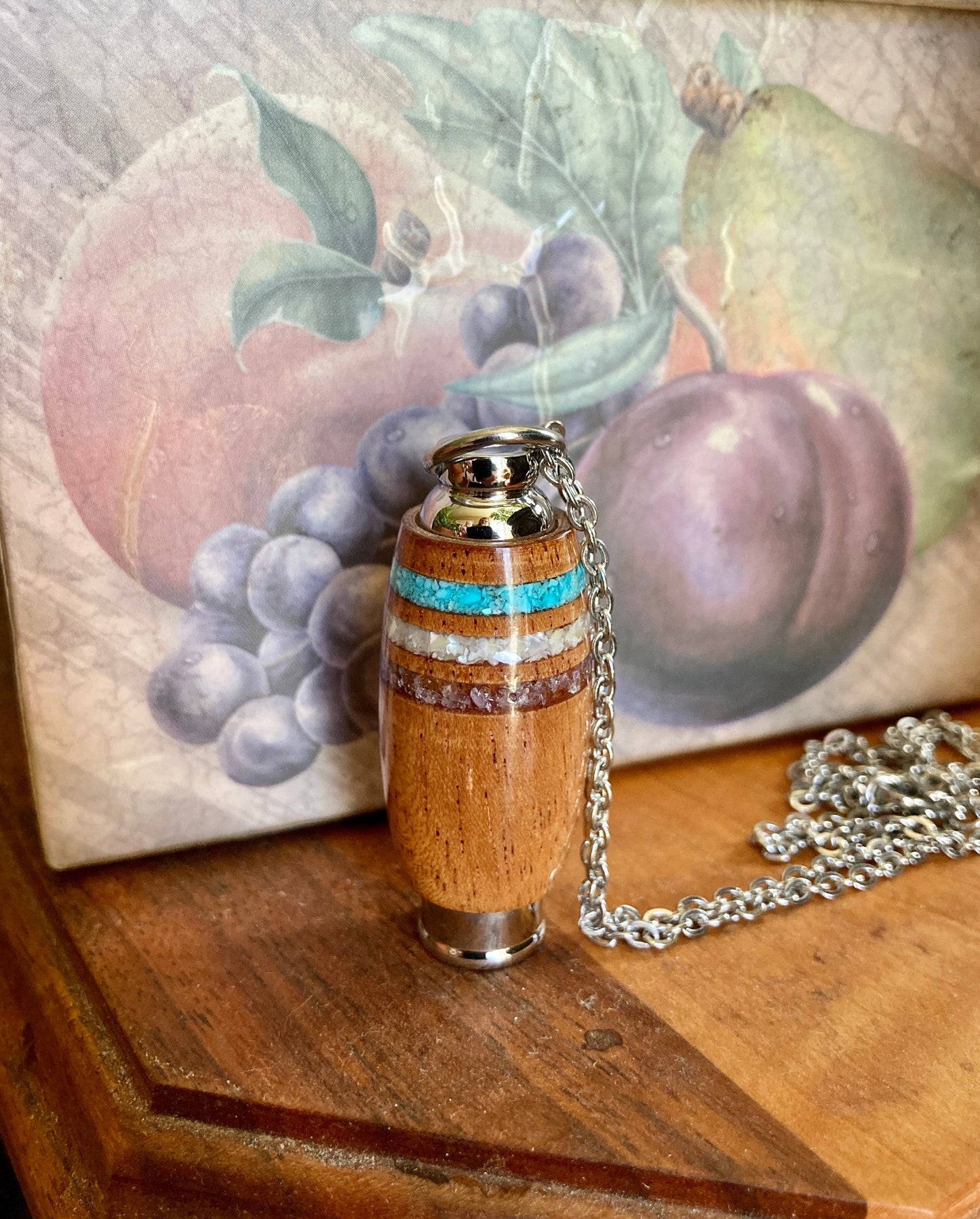 African Mahogany & Stainless Steel Cremation Urn Pendant With Inlays Of Turquoise, Mother-Of-Pearl, & Amethyst